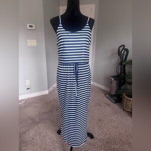 Maxi dress with slits and adjustable straps.Blue and white stripes.Womens Small